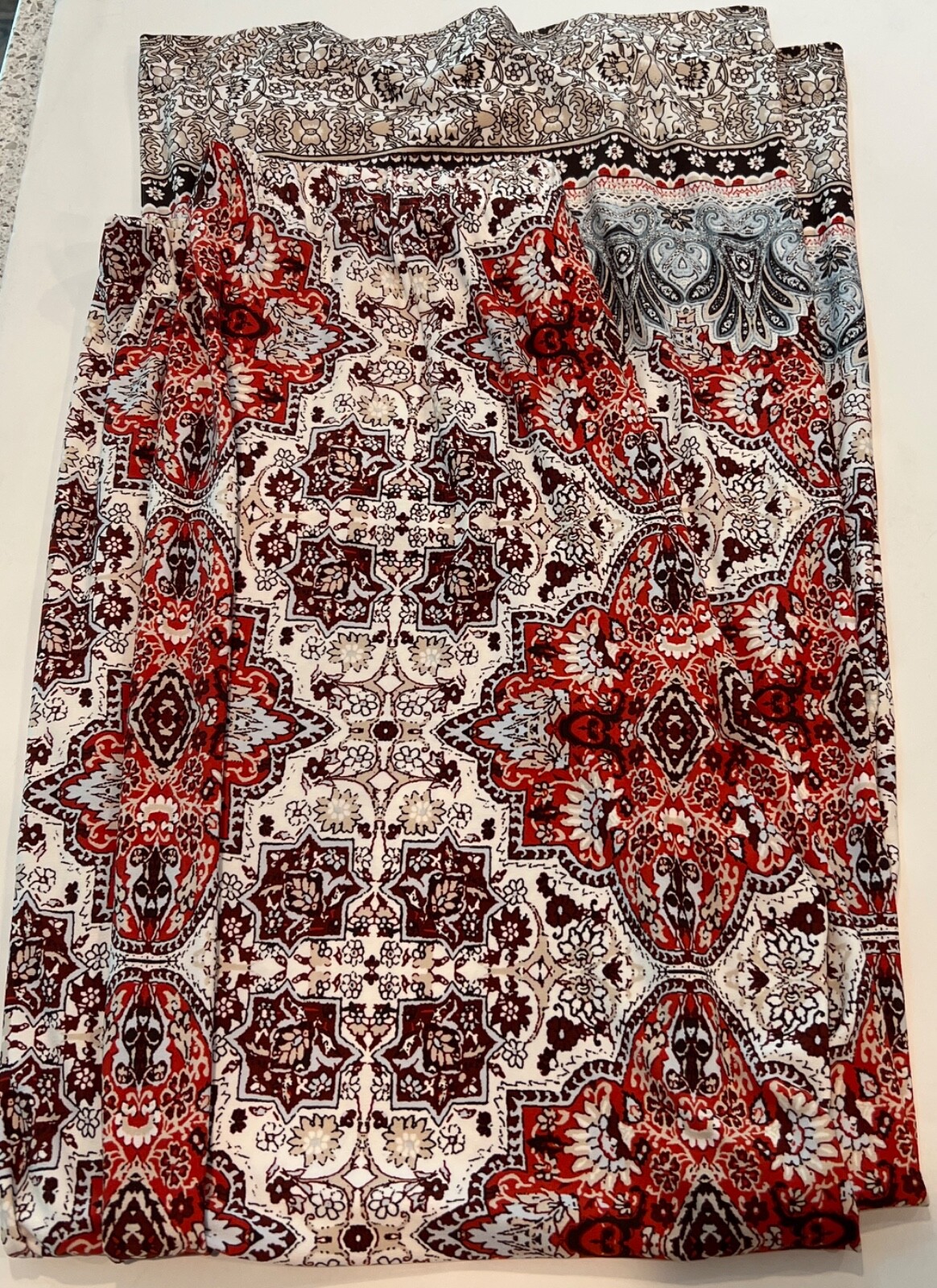 Chicos palazzo pants size 1.5 White, Orange, Maroon Patterns.