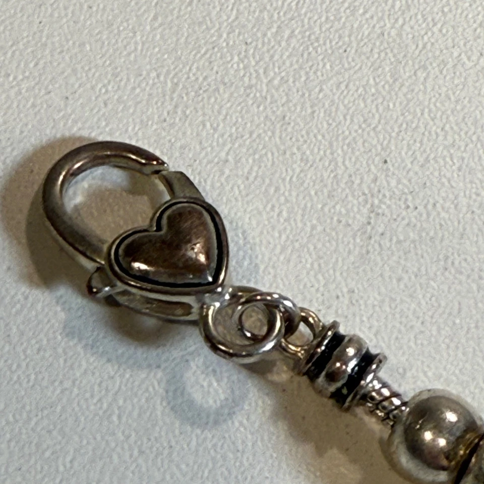 Pulsera Charm Tono Plata con Cuentas Azules y Detalle Corazón Joyería Mujer Foto 3 de 4