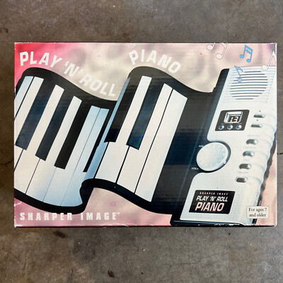 Sharper Image 49 Key Play 'n' Roll Electronic Piano W / AC Power Supply  Used