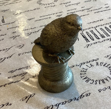 Sainsburys, Gold Tone Bird Sitting on a Cotton Reel