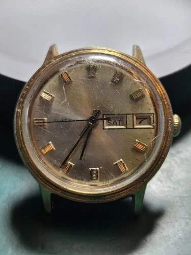 Vintage Timex Day-Date Watch Gold Tone Base Metal Bezel.  Mechanical Movement