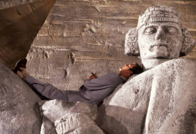 Roger Moore James Bond lays statue cigar filming 1979 James Bond s- Old Photo