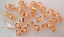 8 4 mm Swarovski 5301 Crystal Bicones -- Light Peach AB