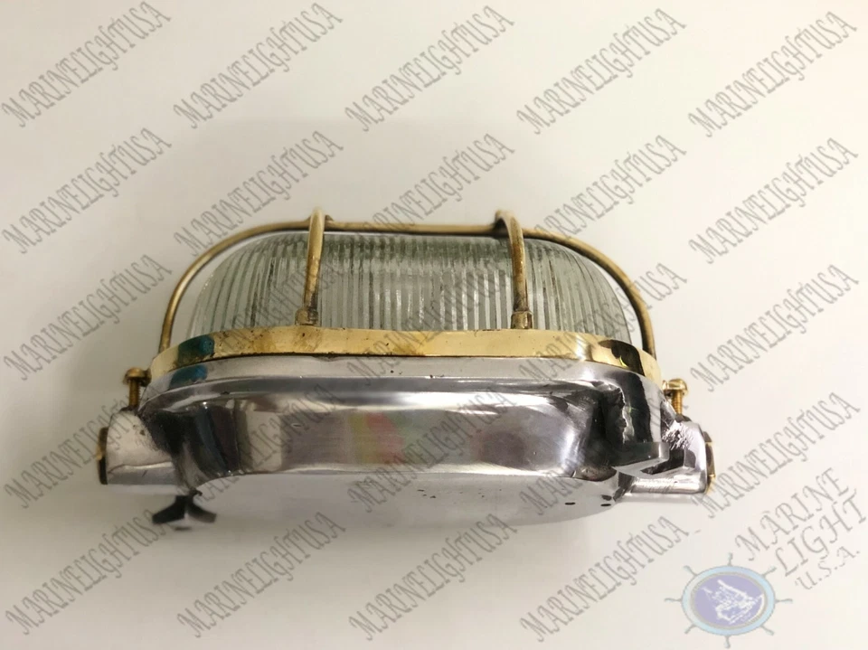 Antigua luz de mampara ovalada montada en la pared de latón macizo decoración náutica Foto 2 de 4