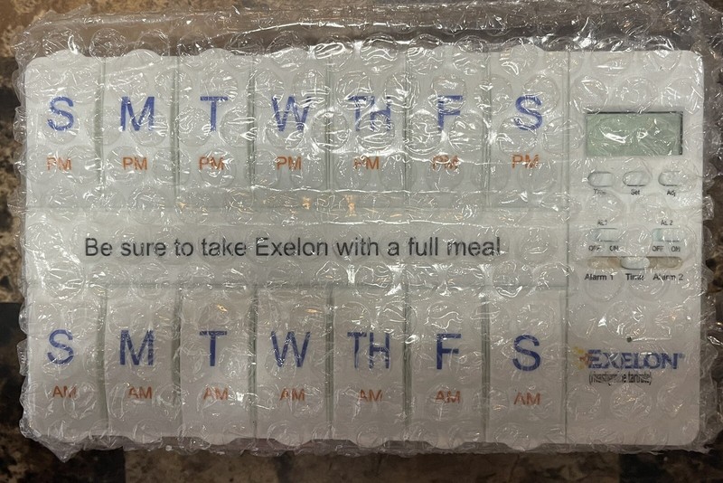 Exelon Drug Rep Pharmaceutical Pill Reminder Box~ 2 Week with Alarm & ~Brand New