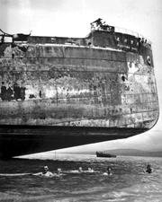 New World War II Photo: U.S. Coast Guardsmen Swim under KINUGAWA MARU - 6 Sizes
