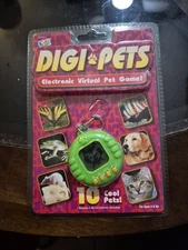 Digi Pets Electronic Virtual Pet Game Green New old stock 2006