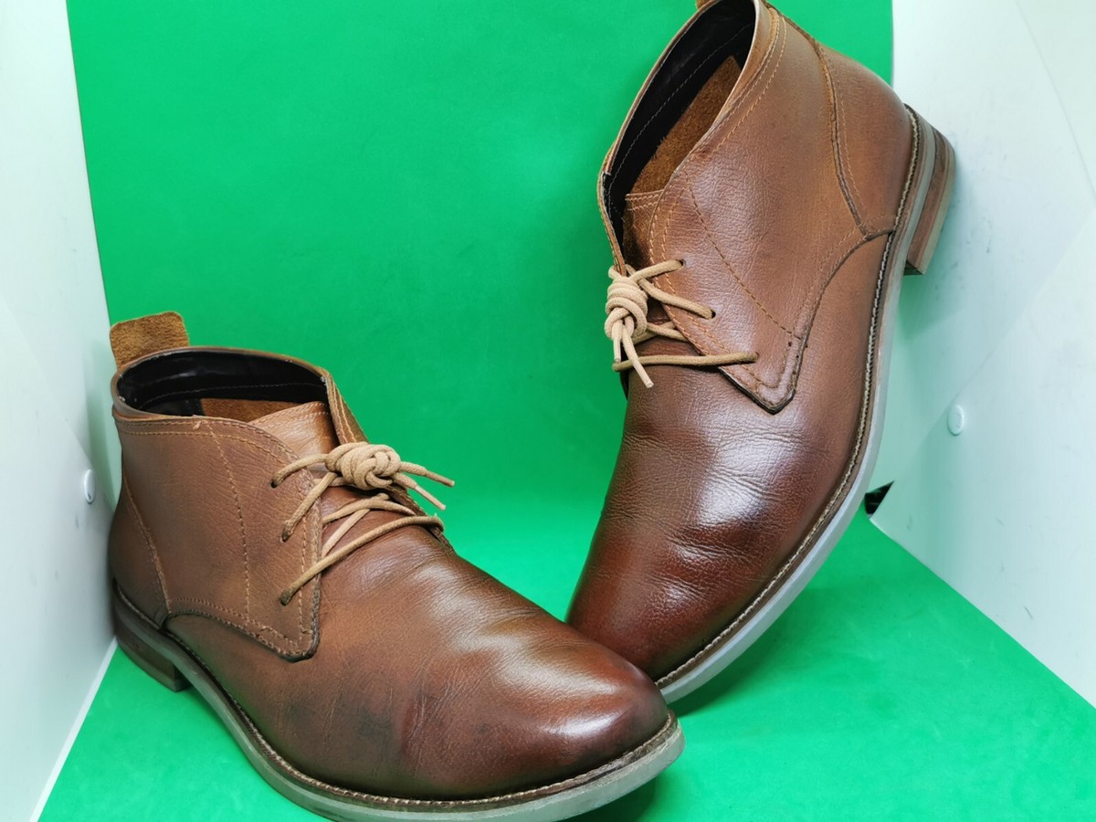 cole haan dress boots mens American Classics Plain Toe Boot Waterproof, British Tan/Alabaster Gleam Waterproof, 7-M US these Chelsea boots from Cole Haan are enhanced with handstitched details on the top heel and a signature woven logo heel pull Cole Haan Men's Chamberlin Grand