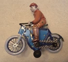 Vintage Schylling Tin Toy Wind Up Man on Bike, Works and Good Condition
