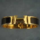 Hermès Gold Tone & Black Enamel Clic H Bracelet - Free Shipping USA