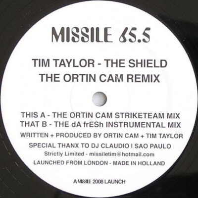 Tim Taylor - The Shield (The Ortin Cam Remix) (12'', Ltd) (Near Mint (NM or M-)) 