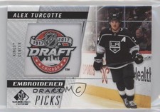 2021-22 Upper Deck SP Game Used Embroidered in History Rookies Alex Turcotte x0a