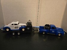 Ertl 1940 Ford Coupe Race Car with Trailer and 1951 Ford Truck Bank Wix Filters