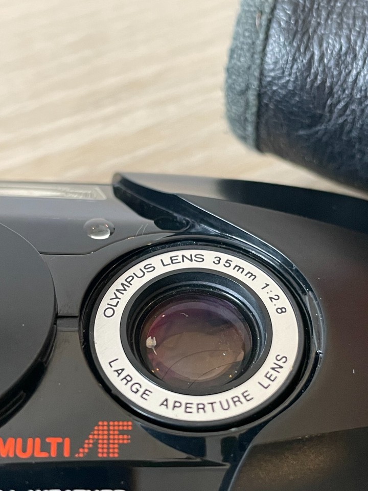 Olympus mju II 35mm f/2.8 camera (light leak see sample image