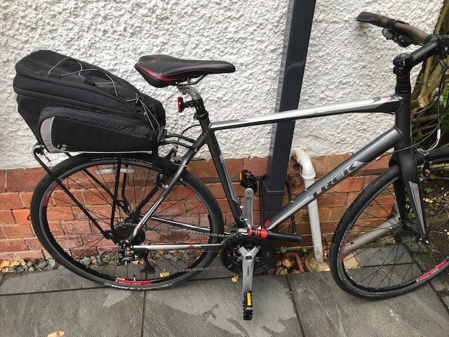 Trek hybrid bike with back rack Bontrager bag;F R lights