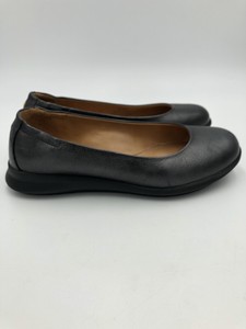 gray leather flats