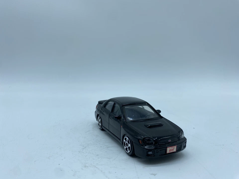MODELLINO AUTO SUBARU IMPREZA WRX STI NERA - BURAGO - SCALA 1:43 NO BOX - Immagine 2 di 4