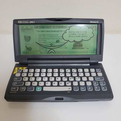 RARE VINTAGE 1997 HP 320LX PDA Palmtop Handheld Notebook PC WITH DOCK & CHARGER