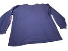 Navy long sleeve Tommy Hilfiger shirt with red and white arm graphic, white collar, and “Denim Made in the USA” text on back.