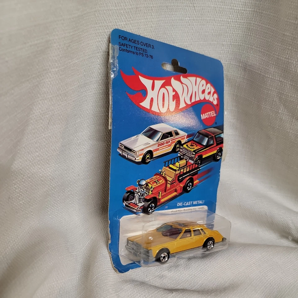Cadillac Seville 1980 Hot Wheels No. Pintura en escamas de metal dorado 1698 diecast Foto 2 de 4