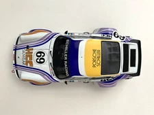 EXOTO Porsche 934 RSR - 1976 LeMans 24 Hours - Vetsch & Haldi - HCC Skiwear #69