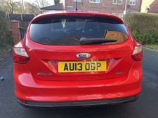 Red Ford Focus Zetec (2013)