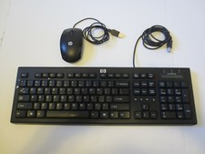 Hewlett Packard Wired Keyboard, Power Cord, and Wired Mouse