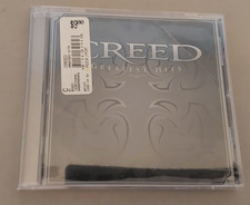 New Creed Greatest Hits CD. crack in case. see pics