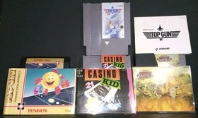 Nes Lot of 4. All With Manuals. Pac Man, Top Gun. Casino Kid. Bid Starts At $1