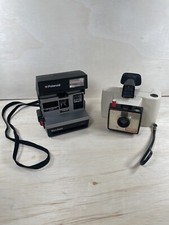 POLAROID CAMERAS SWINGER MODEL 20  SUN 600 LMS LOT OF 2 PAIR VINTAGE UNTESTED
