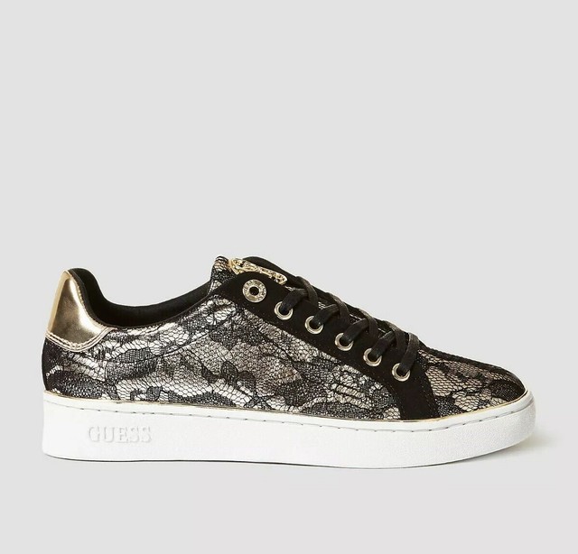 black and gold guess trainers