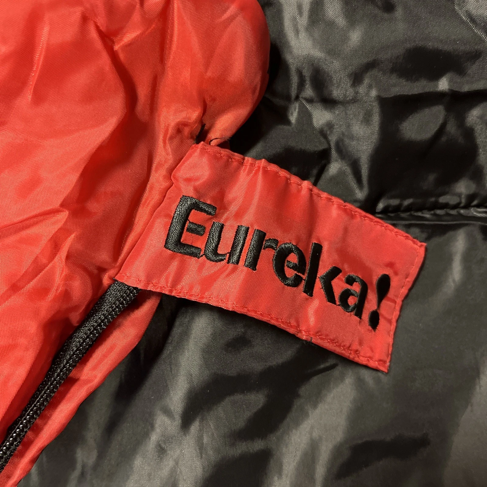 Eureka! Black/ Red New Sleeping Bag With Black Dust Cover Bag