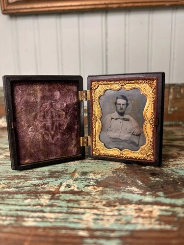 This is a c. 1850s-1860s ambrotype photograph in a   "Union Case" case