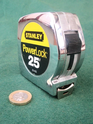 VINTAGE "STANLEY" MAKE 25FT POWERLOCK STEEL TAPE, GRADUATED IN INCHES.