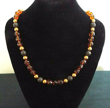 CLEAR AMBER/BROWN FACETED BEADS & METAL PIERCED & GOLD COLOUR BEADS 51cm NECKLAC
