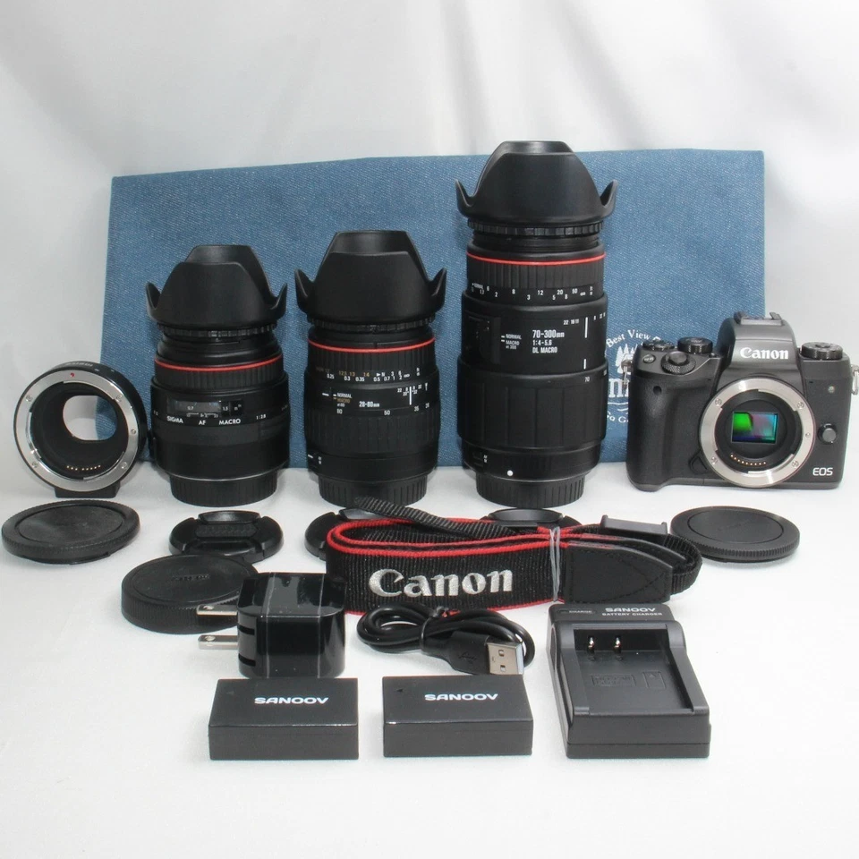 Con batería de repuesto Canon EOS M5 super teleobjetivo triple zoom Foto 2 de 4