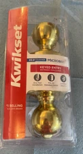 Kwikset 94002-831 Polo Polished Brass Entry Knobs ANSI/BHMA Grade 3 1-3/4 in.