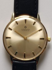 Junghans Herrenarmbanduhr, 585, Handaufzug, vintage aus den 1970 er Jahren