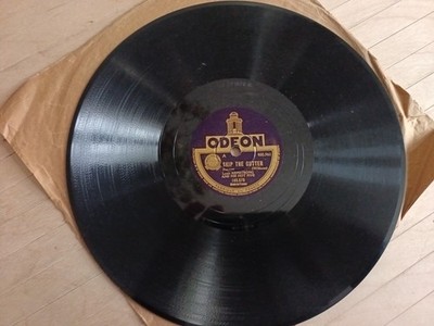 Platte 78 Umdrehungen Odeon. Louis Armstrong. Skip the Gutter. Knie Tropfen. 165578.