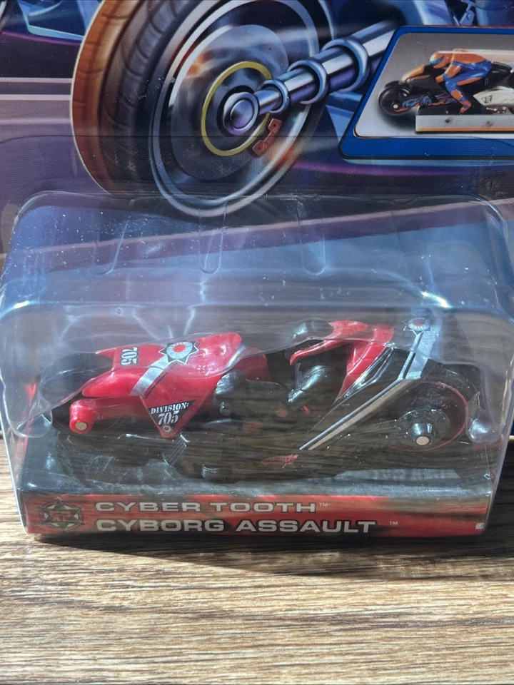 Hotwheels Thunder Cycles Cybertooth Cyborg Assault 2004 variante roja Foto 3 de 4