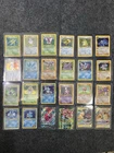 24 Pokemon Card Lot Vintage WotC Team Rocket Base Set Tag Team GX MP/Damaged