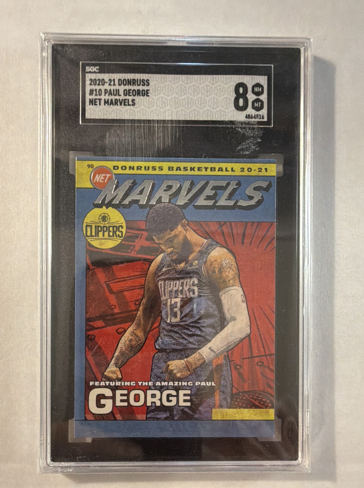 Paul George #10 (Basketball Cards 2020 Donruss Net Marvels) — is it worth grading?