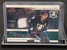 2003-04 SUPREME HOCKEY AUTHENTIC GAME-WORN JERSEY /700 SERGEI FEDOROV #1