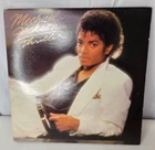 Thriller by Michael Jackson Vinyl with Bonus MJ papers & cardboard photo