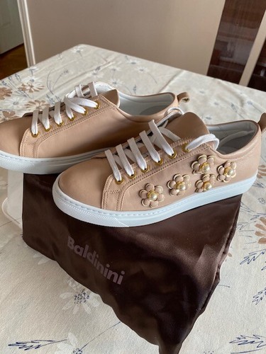 beige designer sneakers