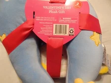 NECK PILLOW AND PLUSH THROW