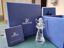 Angelo con stella tra le mani: decorazione di Natale Swarovski