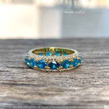 2ct Oval Cut Lab-Created Blue Topaz Eternity Wedding Band 14K Yellow Gold Plated
