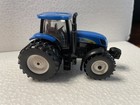 Ertyl Ford set 1/64th scale.3 TRACTORS, GRAVITY WAGON, BALER, 2DISCS, PLOW — photo 1