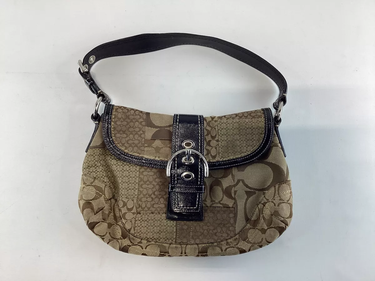 Coach black and tan purse sale
